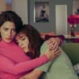 Cena do filme Natal Amargo com atores em momento emocional durante exibição em Cannes